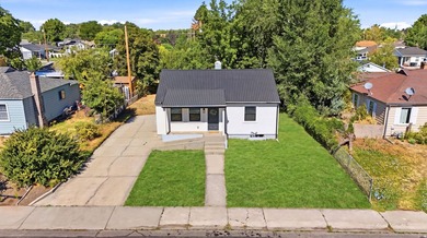 Fresh, updated, and move-in ready! This 4-bedroom, 2-bath home - photo 1