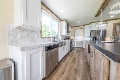 Acreage near the lake! Newer home and option to purchase dock. - photo 11