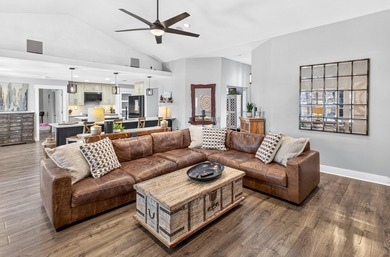 Nestled on a .54 acre corner cul-de-sac lot in the gated - photo 15