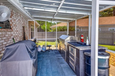 Nestled on a .54 acre corner cul-de-sac lot in the gated - photo 20