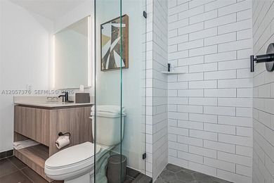 Breathtaking high-floor coastal living awaits in the heart of - photo 22
