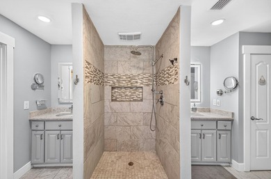 Nestled on a .54 acre corner cul-de-sac lot in the gated - photo 29