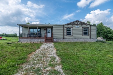 Acreage near the lake! Newer home and option to purchase dock. - photo 1
