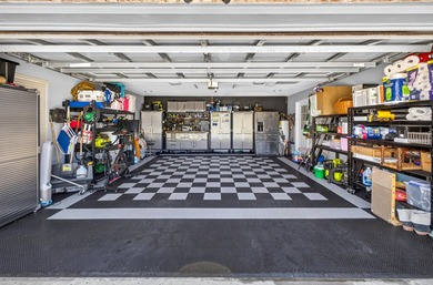 Nestled on a .54 acre corner cul-de-sac lot in the gated - photo 50