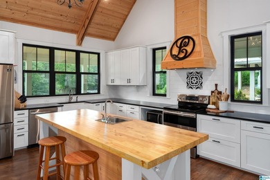 Experience luxury lakefront living in this stunning custom-built - photo 23