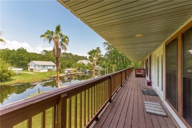 This unique waterfront property offers direct, year-round