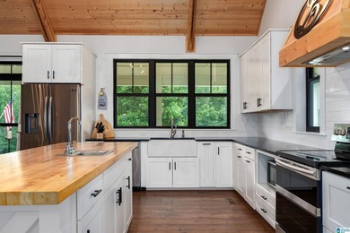 Experience luxury lakefront living in this stunning custom-built - photo 24