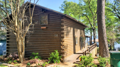 WATERFRONT LOG CABIN WITH BOATHOUSE ON LAKE PALESTINE - Lake Home For Sale in Frankston, Texas