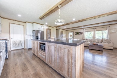 Acreage near the lake! Newer home and option to purchase dock. - photo 12