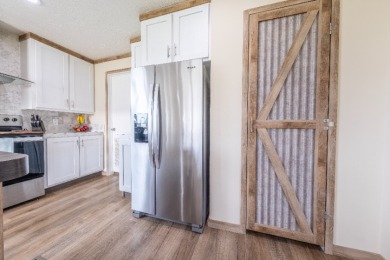 Acreage near the lake! Newer home and option to purchase dock. - photo 18