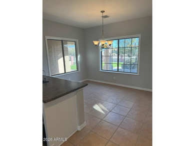 Amazing LAKE FRONT 3 bed 2 bath, fully landscaped TURF front and - photo 7