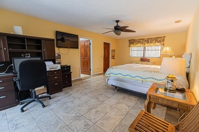 Tropical living awaits in Sandpiper Bay! Situated on an - photo 11