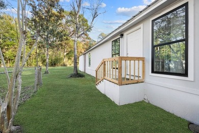 Nestled on a sprawling 0.68-acre parcel of unrestricted - photo 23
