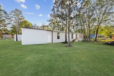 Nestled on a sprawling 0.68-acre parcel of unrestricted - photo 24