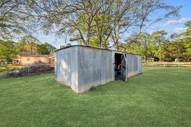 Nestled on a sprawling 0.68-acre parcel of unrestricted - photo 25