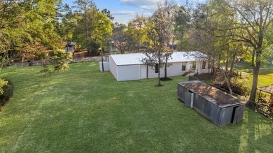 Nestled on a sprawling 0.68-acre parcel of unrestricted - photo 27