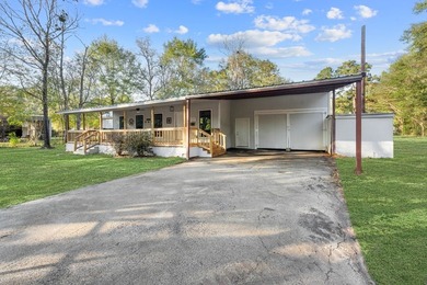 Nestled on a sprawling 0.68-acre parcel of unrestricted - photo 28