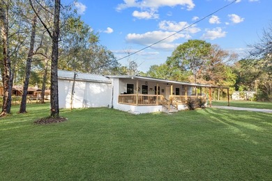 Nestled on a sprawling 0.68-acre parcel of unrestricted - photo 29