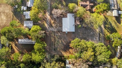 Nestled on a sprawling 0.68-acre parcel of unrestricted - photo 31
