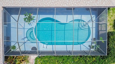 Tropical living awaits in Sandpiper Bay! Situated on an - photo 32