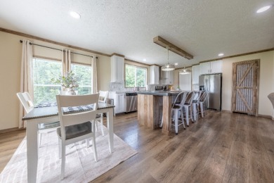 Acreage near the lake! Newer home and option to purchase dock. - photo 10