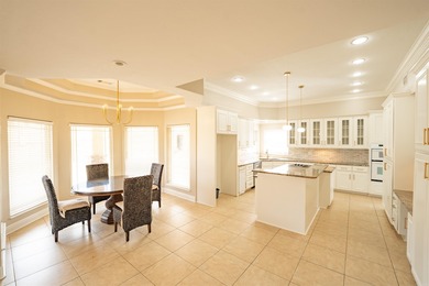 Oversized double entry doors open to a grand two-story foyer - photo 11