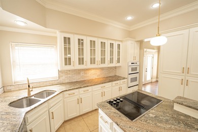 Oversized double entry doors open to a grand two-story foyer - photo 12