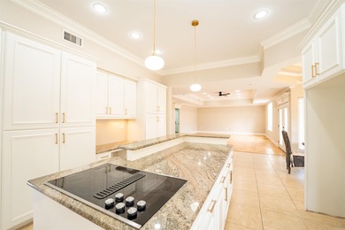 Oversized double entry doors open to a grand two-story foyer - photo 15