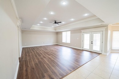 Oversized double entry doors open to a grand two-story foyer - photo 16