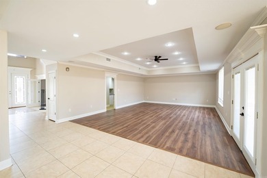 Oversized double entry doors open to a grand two-story foyer - photo 17