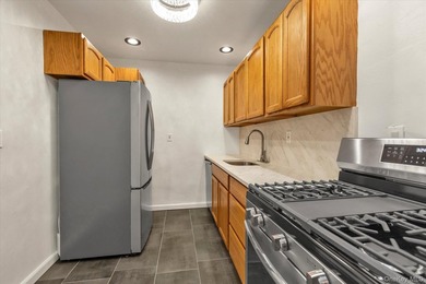 Experience modern comfort in this oversized one-bedroom COOP - photo 18