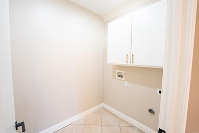 Oversized double entry doors open to a grand two-story foyer - photo 21