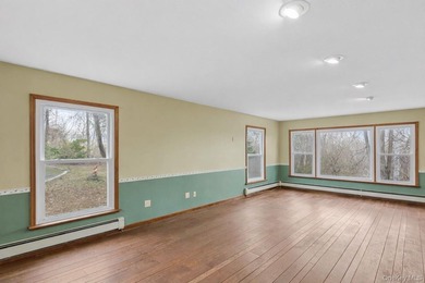 Set on a quiet, tree-lined cul-de-sac in Wading River and - photo 6