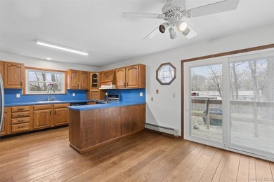Set on a quiet, tree-lined cul-de-sac in Wading River and - photo 10