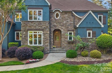 Set on a beautifully landscaped corner lot in a highly - photo 4