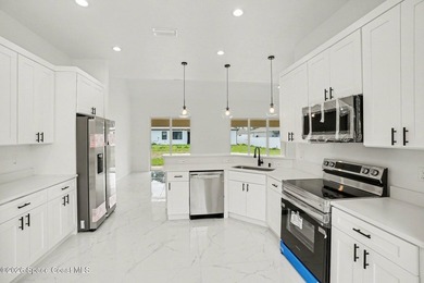 This beautifully designed 4 bed 2 bath concrete block home - photo 3