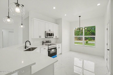 This beautifully designed 4 bed 2 bath concrete block home - photo 5