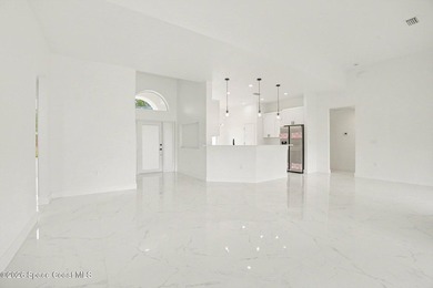 This beautifully designed 4 bed 2 bath concrete block home - photo 9