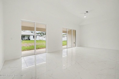 This beautifully designed 4 bed 2 bath concrete block home - photo 10