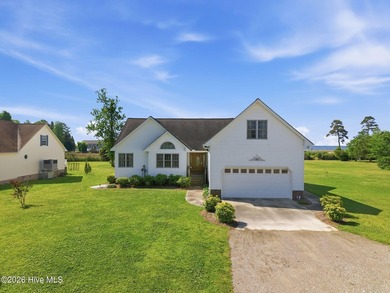 Discover waterfront living! Beautifully situated one-story home - photo 2