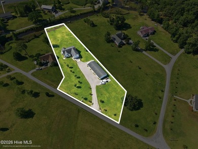 Discover waterfront living! Beautifully situated one-story home - photo 3