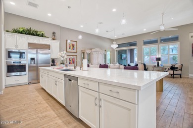 Experience sophisticated villa living in this gated North