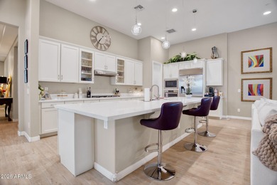 Experience sophisticated villa living in this gated North