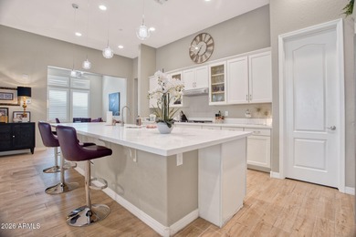 Experience sophisticated villa living in this gated North