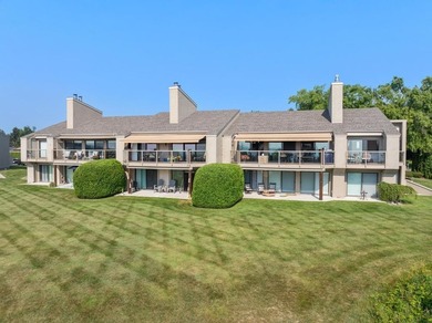 Welcome to one of Charlevoix's most coveted addresses. Perched - photo 26