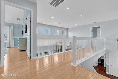 Welcome to 26 Jib Court, a spectacular waterfront retreat tucked - photo 31