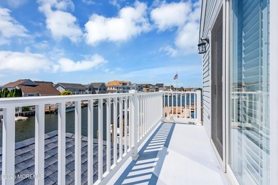 Welcome to 26 Jib Court, a spectacular waterfront retreat tucked - photo 41