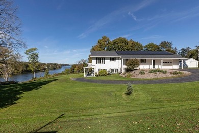 A truly special property! Enjoy stunning river views year-round - photo 3