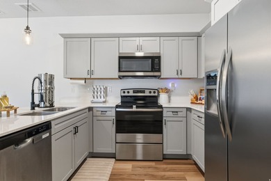 Beautiful Edge condo featuring 9-foot ceilings, ample storage - photo 6