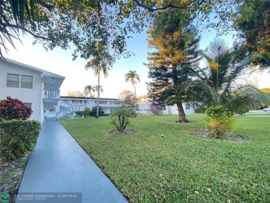 Lake Condo For Sale in Deerfield Beach, Florida